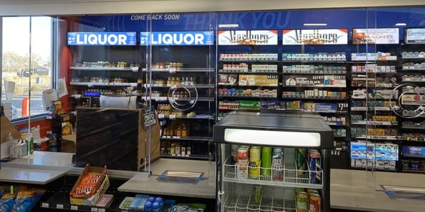 gas station counter with transparent barrier