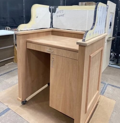 A podium custom designed to include bullet resistance protection, preventing penetration from a certain number of bullets based on the UL rating