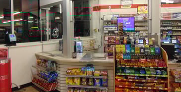 clear glass barrier in gas station