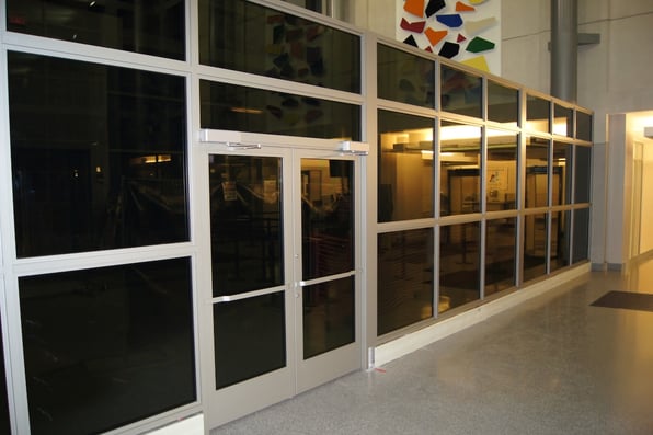 A bulletproof storefront system. This is different from a curtain wall in that it has an entryway.