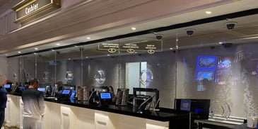 casino counter with clear glass barrier