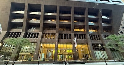 An example of a building where you could use security window film tested to the ASTM E1996 standard alongside ballistic barriers to prevent damage and ensure safety.