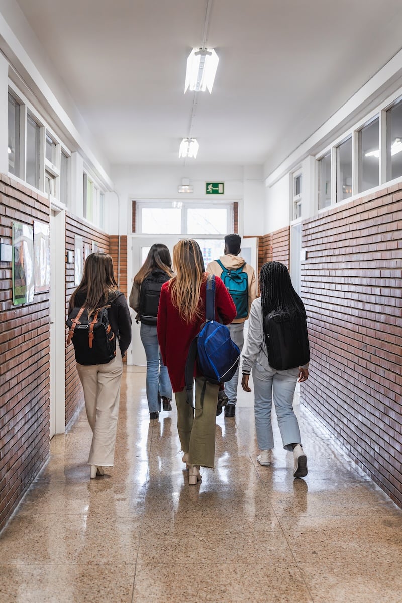A group of middle school students walk through the hallway, illustrating the importance of emergency preparedness.