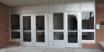 storefront with aluminum doors