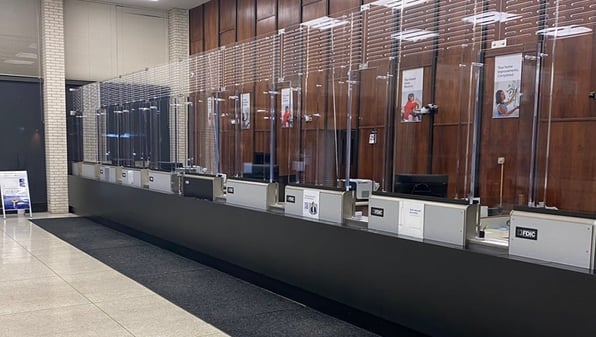 Bank windows protected by a transaction line system.