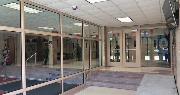 Windows and doors in a school lobby, an ideal area for SchoolDefender glass. 